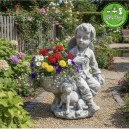 Fiú szobor virágtartóval kerti dekoráció